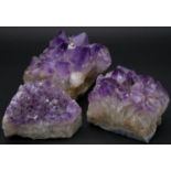 Three large amethyst crystal pieces. H.11 L.15 W.14cm