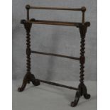 A Victorian mahogany towel rail on stretchered barleytwist cabriole supports. H.88 L.70 W.31cm