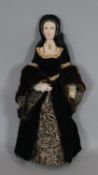 A boxed hand made painted ceramic and fabric doll of Anne Boleyn. With makers label, by Jean