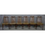 A set of mid century vintage teak G-Plan dining chairs with maker's label to the underside. H.91cm