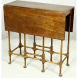 A 19th century mahogany drop flap table on turned spider leg supports. H.71 W.83 D.71cm