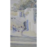 A framed and glazed watercolour, North African street scene, unsigned. H.51 W.43cm