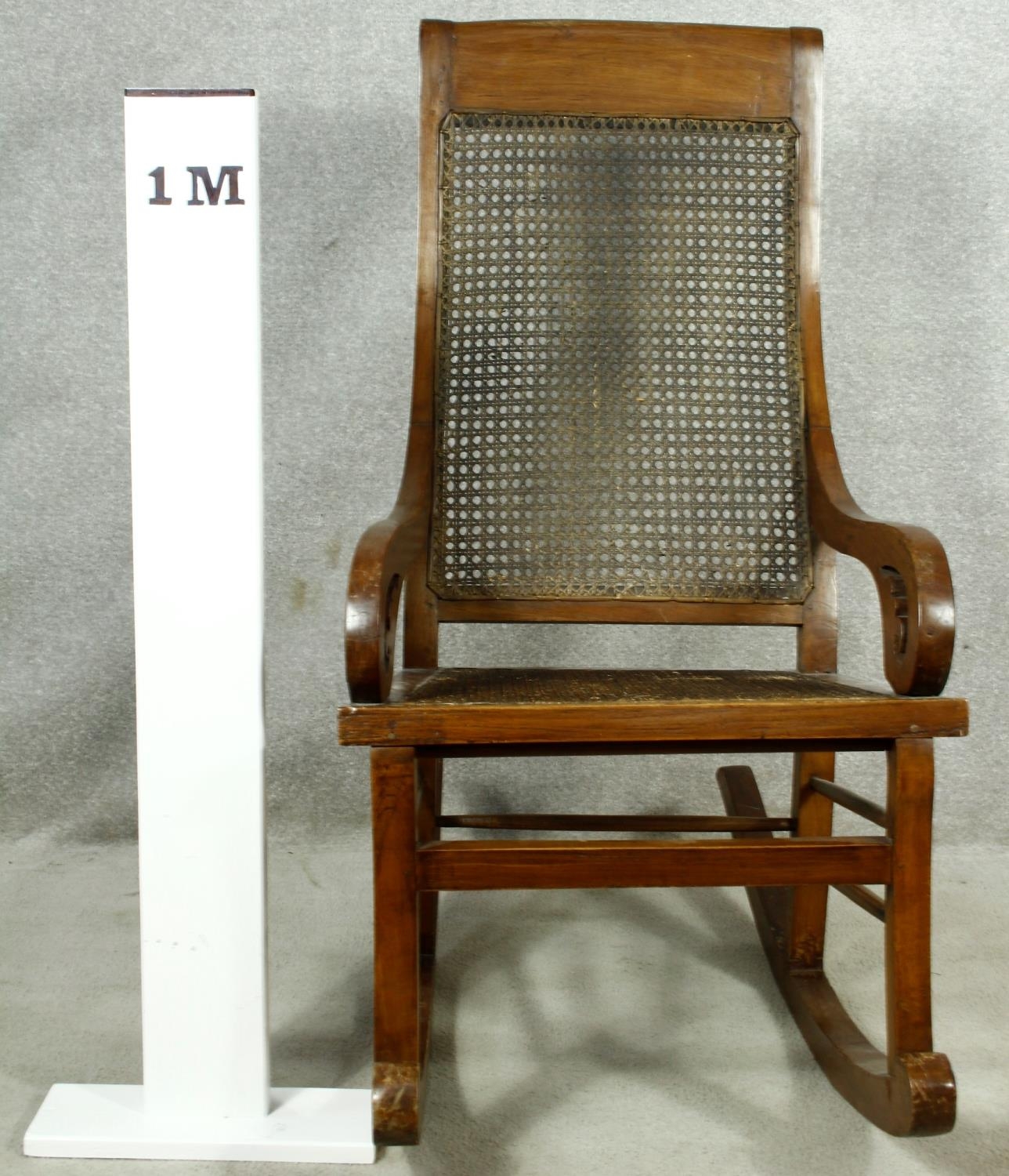 A 19th century Colonial style teak rocking chair with caned back and seat. H.111cm - Image 5 of 5