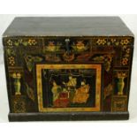 A 19th century Chinese chest with twin carrying handles and hand decorated with lacquered panels.