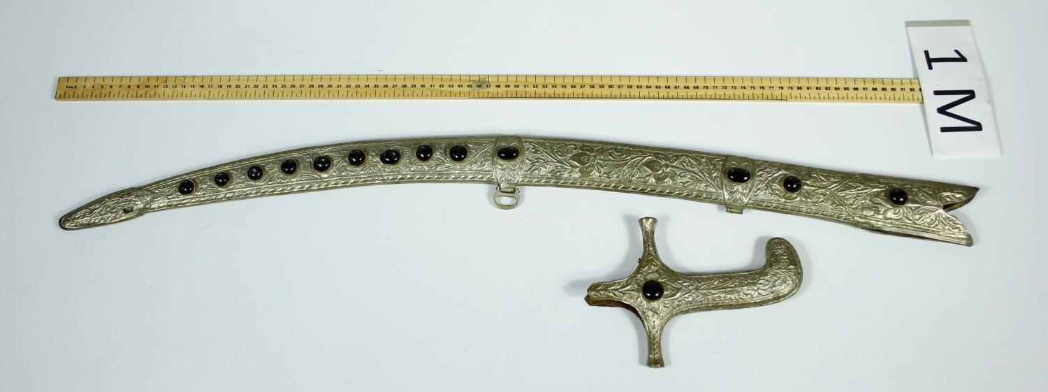 An Indian white metal foliate repousse and floral engraved sword scabbard and hilt set with fourteen - Image 3 of 5