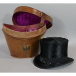 A vintage Christys top hat in fitted leather carrying case. H.28 L.35 W.33cm (Box)
