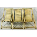 Three bamboo and slatted deck chairs. H.96cm (one in need of repair as photographed).