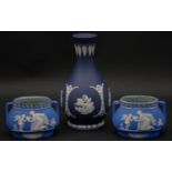 Three pieces of 20th century blue and white Wedgwood Jasperware. Including a pair of two handled