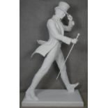 A life size white fibreglass figure of Johnnie Walker on a rectangular base, stamped Johnnie Walker.
