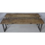 A pair of metal framed refectory benches with planked tops. H.45.5 L.150 W.31.5cm