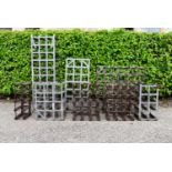 A collection of eight wine racks, various sizes. H.100 W.34 D.24cm (8)