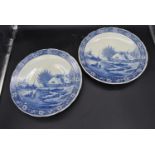 A pair of Dutch blue and white plates with maker's mark to base. Dia.39cm