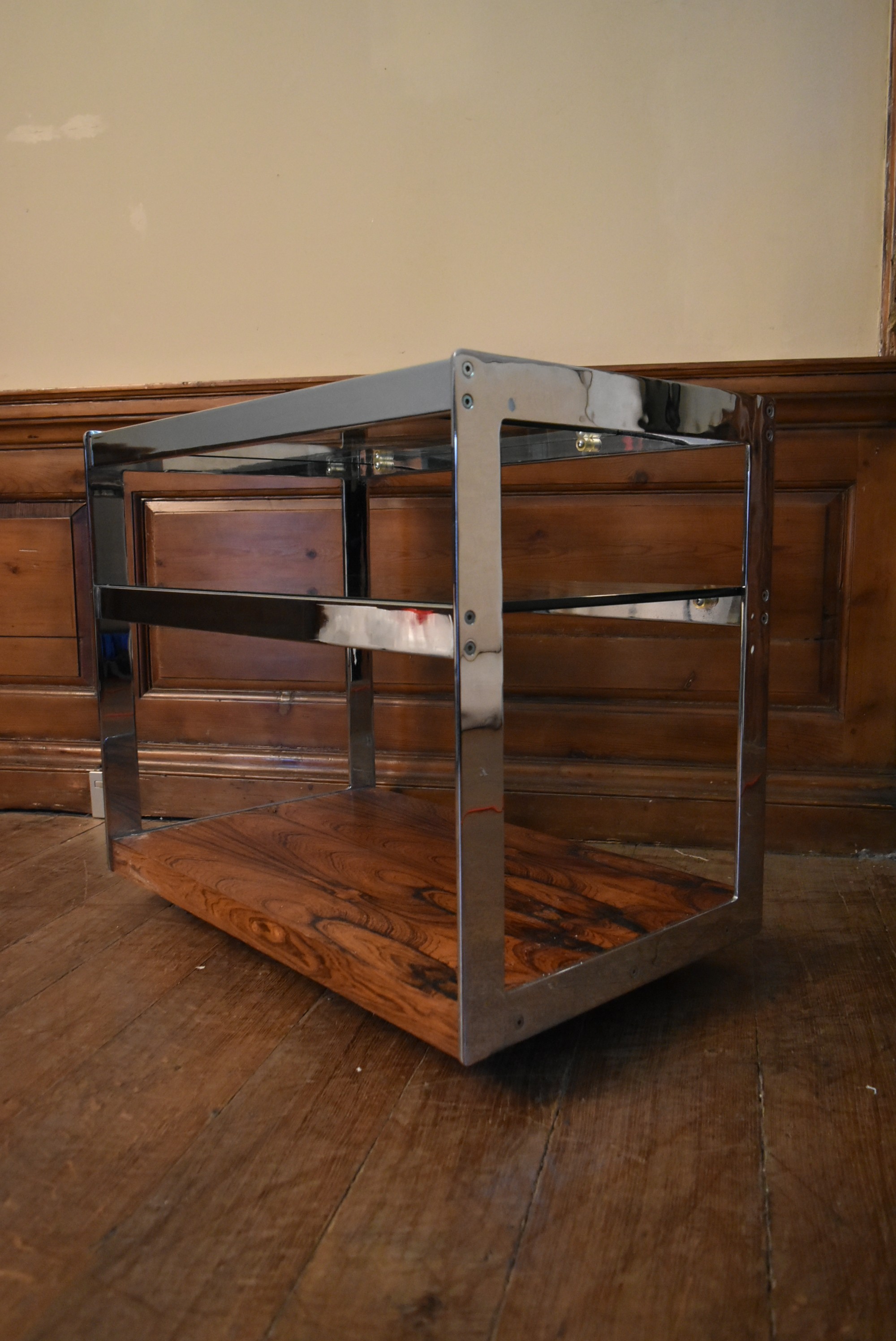 A Merrow Associates chrome framed drinks trolley with plate glass tiers on casters. H.64 W.73 D.46cm - Image 5 of 6