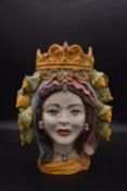 A Sicilian Teste di Moro majolica hand painted ceramic vase in the form of a ladies head with lemons