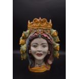 A Sicilian Teste di Moro majolica hand painted ceramic vase in the form of a ladies head with lemons
