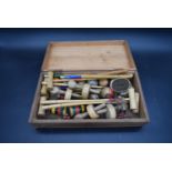 A vintage miniature table top croquet set in its original box. H.10 W.36 D.19cm