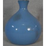 A large bulbous form vase in pale blue glaze. H.60cm