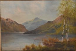 A late 19th century gilt framed oil on canvas, lake scene. H.63cm W.83cm (damaged as photographed).