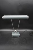 A mid century vintage chrome and metal desk lamp with twin bulb fittings in an adjustable shade. H.