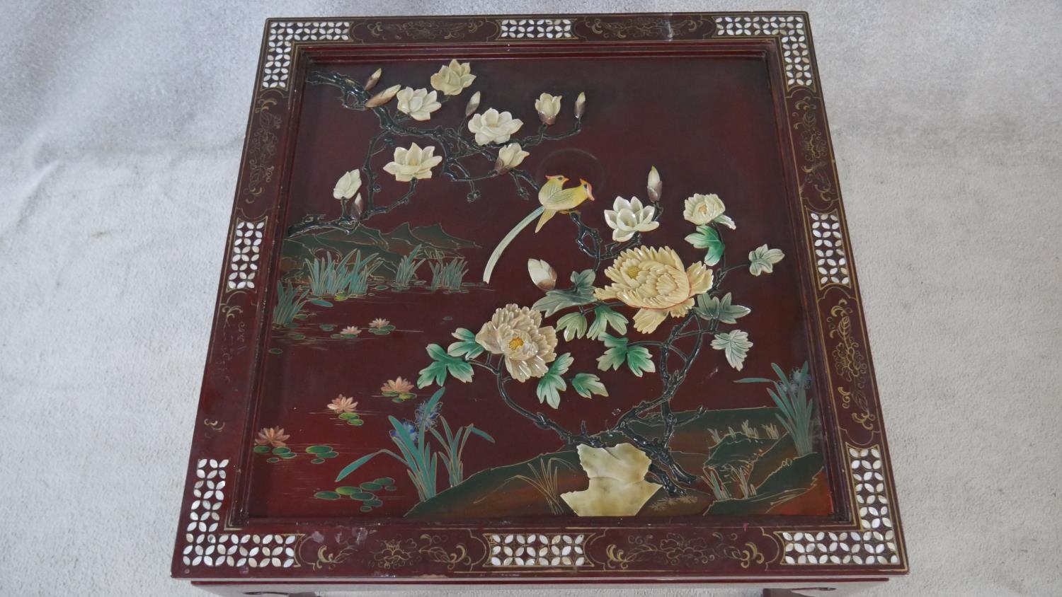 A Chinese black lacquered coffee table with bevelled plate glass drop in top, applied bird and - Image 3 of 8