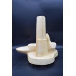 A cast plaster abstract modernist sculpture. H.46 W.46 D.26cm