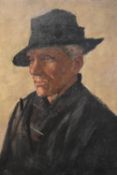 An unframed oil on canvas, head and shoulders portrait of a man in a trilby hat, unsigned. H.61 W.