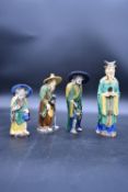 Four Chinese Sancai glazed ceramic figures of immortals in traditional robes. H.26cm