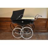 A 1974 coach built Silver Cross Dijon pram fully restored and refurbished in modern materials. H.120