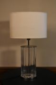 A contemporary chrome and Perspex table lamp base and shade. H.64 W.36cm