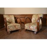 A pair of vintage French Art Deco style armchairs in floral silk upholstery. H.71 W.66 D.57cm