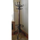 A 19th century bentwood coat and umbrella hallstand. H.200cm (two coat hooks are missing as
