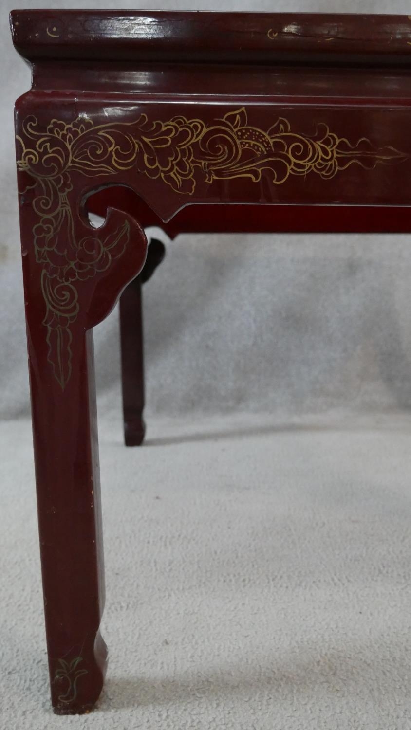 A Chinese black lacquered coffee table with bevelled plate glass drop in top, applied bird and - Image 4 of 8