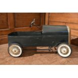 An early 20th century child's pedal car in original condition. H.35 W.75 D.33cm