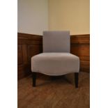 A contemporary nursing chair in velour upholstery. H.82 W.62 D.50cm