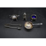 A silver plated Mappin and Webb three piece condiment set along with silver plated sugar nips and