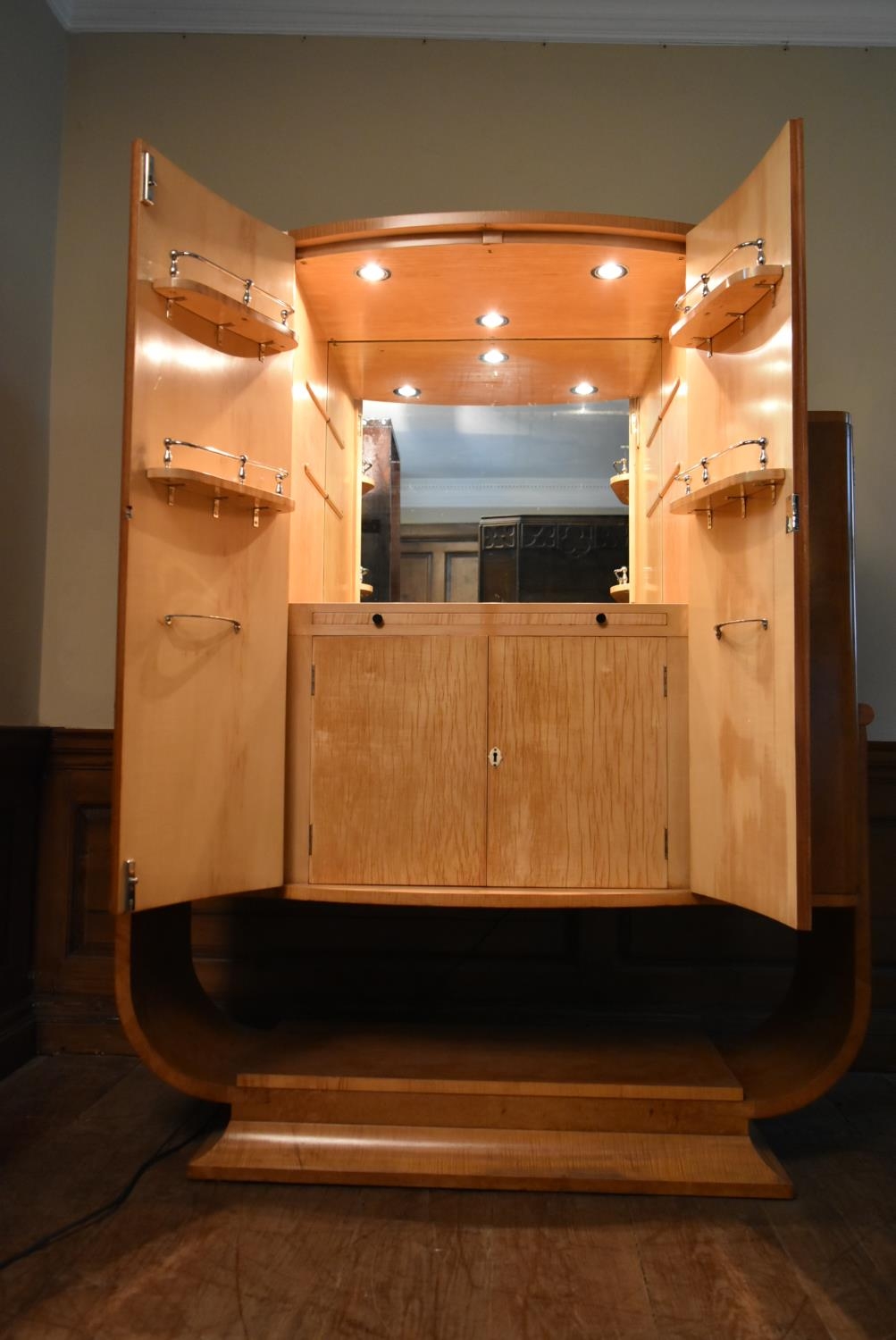 An Art Deco burr walnut cocktail cabinet with ribbed central panel doors enclosing glazed and lit - Image 4 of 23