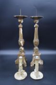 A pair of 19th century carved giltwood and gesso ecclesiastic style pricket candlesticks and a