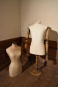 A vintage Stockman female mannequin and a vintage style Kent and Curwen male mannequin on stand with