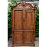 An American Colonial style elm four door cabinet enclosing fitted drawers. H.210 W.120 D.46cm