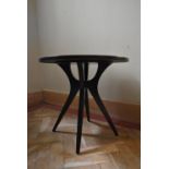 A vintage style occasional table on quadruped splay supports. H.56 Dia.60cm