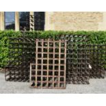 A collection of seven wine racks, various sizes. H.137 W.34 D.24cm (7)