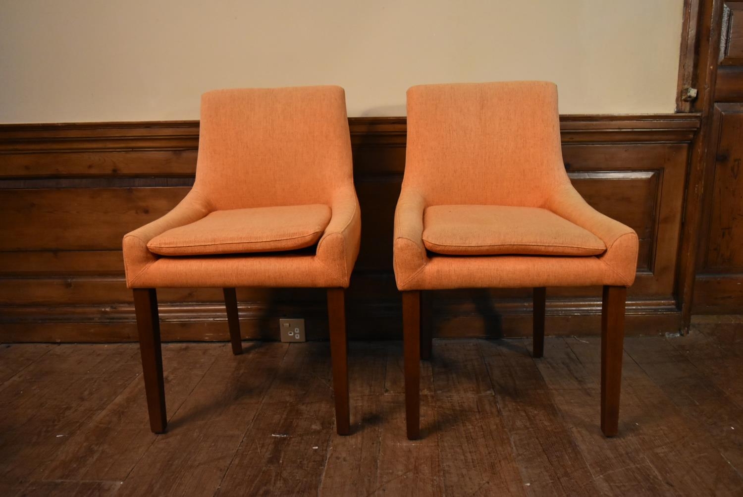 A pair of contemporary dining chairs in calico upholstery. H.85 W.53 D.45cm