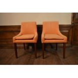 A pair of contemporary dining chairs in calico upholstery. H.85 W.53 D.45cm