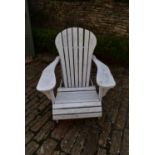 A vintage white painted and slatted garden reclining armchair. H.90 W.78 D.60cm