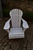 A vintage white painted and slatted garden reclining armchair. H.90 W.78 D.60cm