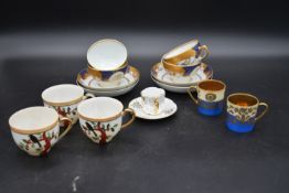 A set of four Garrrard blue and gilt Chinese influenced cups and saucers, three Japanese cups, a