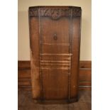 A vintage oak Jacobean style hall cupboard. H.183 W.95 D.35cm