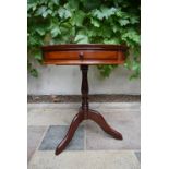 A Chinese hardwood small drum table fitted with frieze drawer. H.65cm Dia.56cm