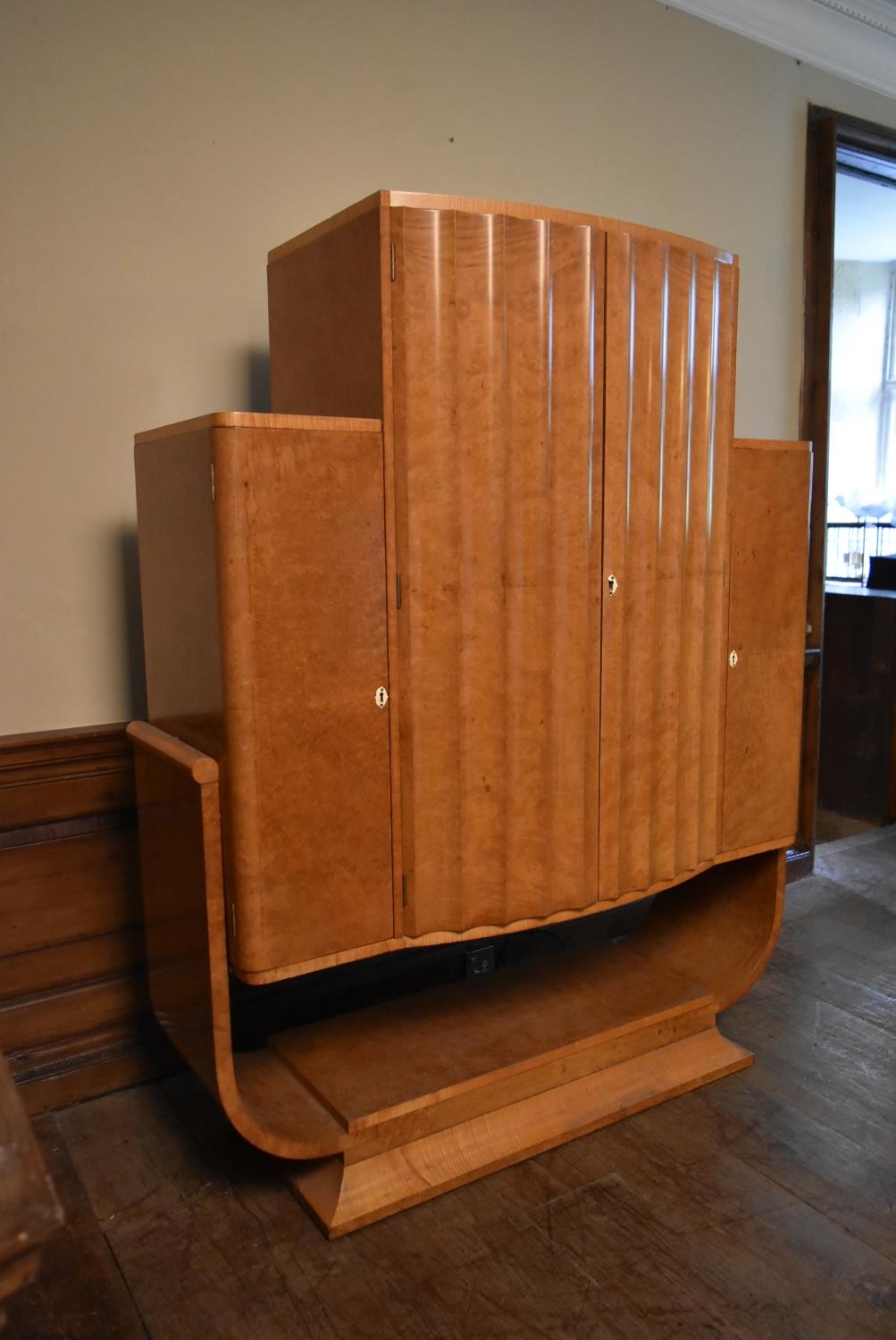 An Art Deco burr walnut cocktail cabinet with ribbed central panel doors enclosing glazed and lit - Image 5 of 23