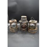 Three vintage railway lanterns. H.35 W.23cm (largest)